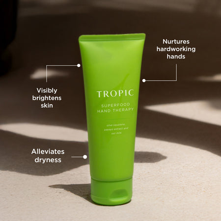 Superfood Hand Therapy is in a green tube with white writing. The product visibly brightens skin, nurtures hardworking hands and alleviates dryness.